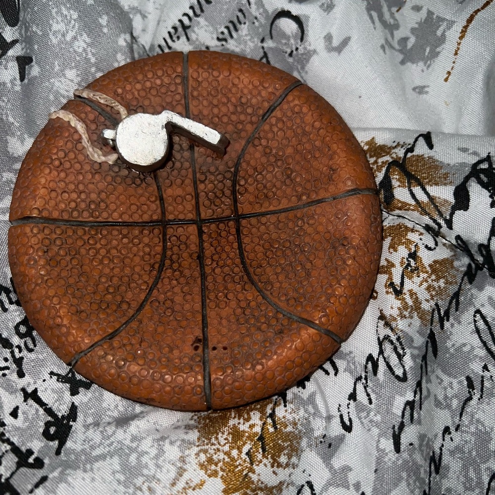 Basketball coin holder